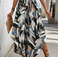Women's Vacation Maxi Dress: Irregular Waist Design, Asymmetrical Hem, and Leaf Print